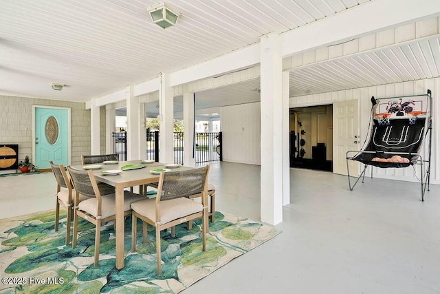 dining room with finished concrete flooring