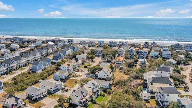 aerial view featuring a residential view and a water view