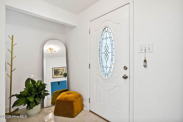 foyer featuring light tile patterned floors