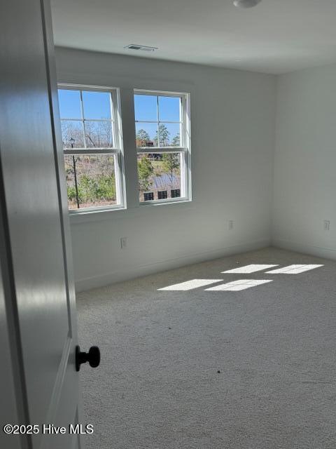 bathroom featuring concrete flooring and wood walls