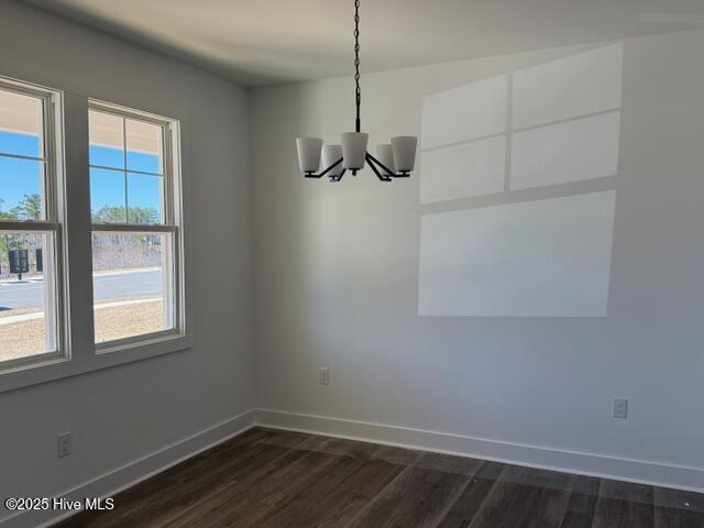 unfurnished living room with ceiling fan and a fireplace