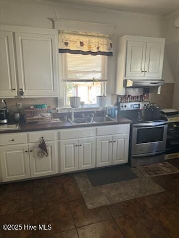 kitchen featuring under cabinet range hood, a sink, white cabinets, and stainless steel range with electric cooktop