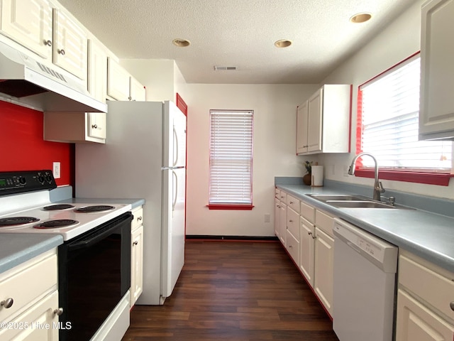 kitchen with white cabinetry, dishwasher, sink, dark hardwood / wood-style flooring, and electric range