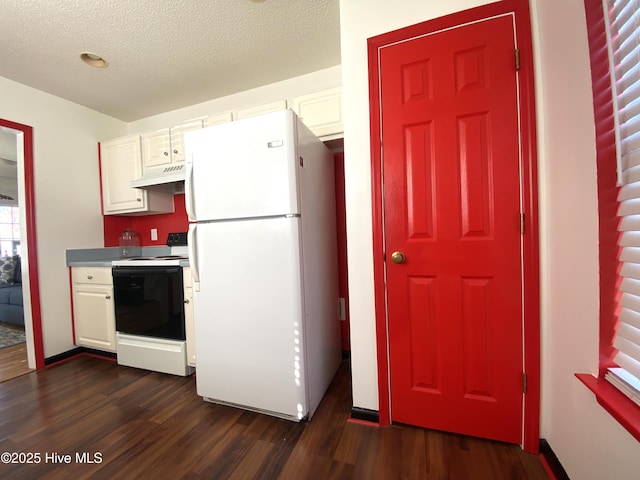 kitchen featuring white refrigerator, dark hardwood / wood-style floors, electric range oven, and white cabinets