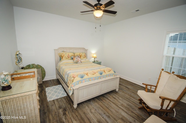 bedroom featuring dark wood-type flooring and ceiling fan