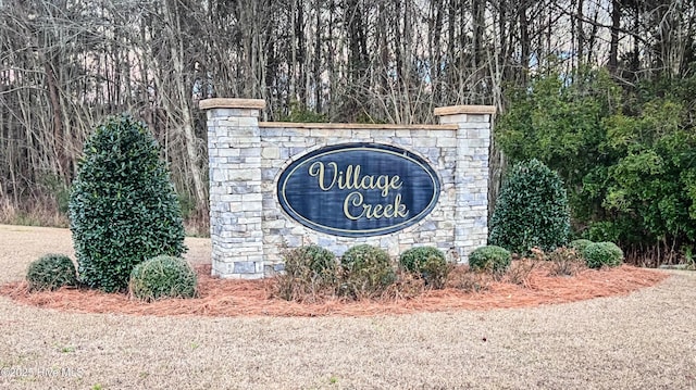 view of community sign