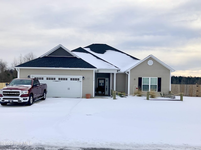 single story home with a garage