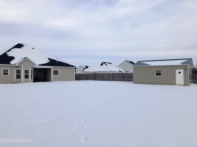 view of yard layered in snow