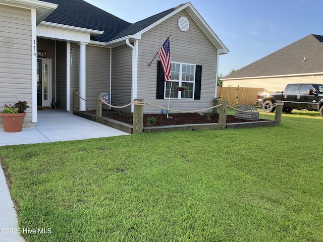 exterior space featuring a yard and a patio