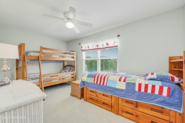 bedroom featuring ceiling fan and carpet flooring