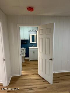 hallway featuring light hardwood / wood-style floors