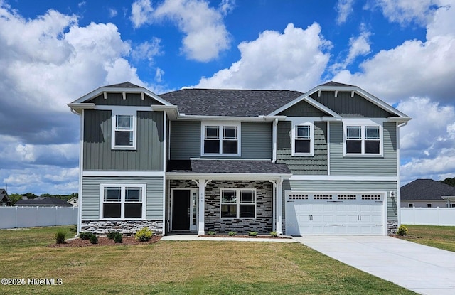 craftsman-style house with a garage and a front yard