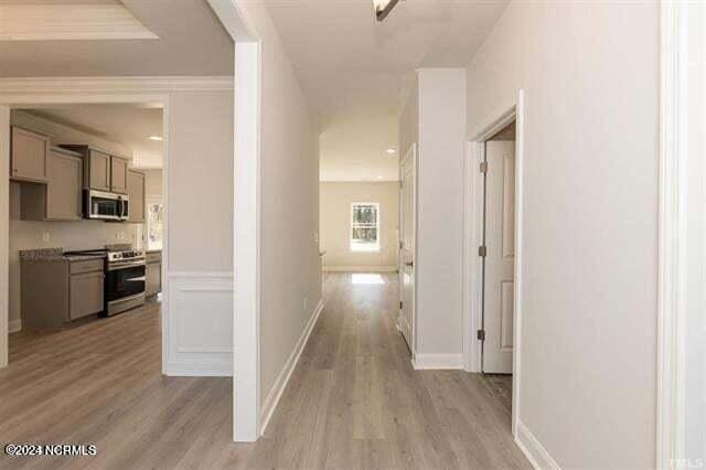 hallway featuring light hardwood / wood-style floors