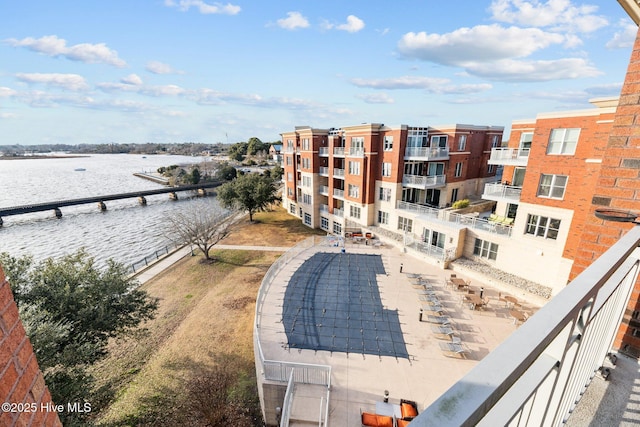 exterior space with a water view