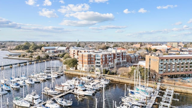 birds eye view of property featuring a water view