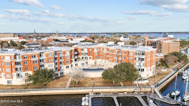 birds eye view of property featuring a water view