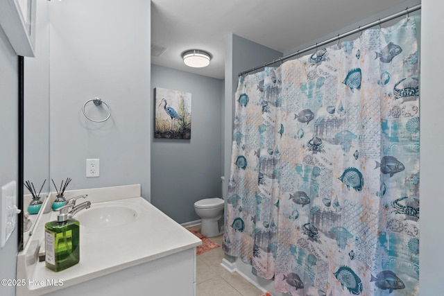 bathroom featuring vanity, toilet, tile patterned floors, and a shower with curtain