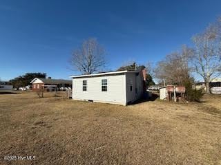 exterior space with a yard