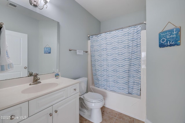 full bathroom with tile patterned flooring, toilet, vanity, visible vents, and shower / bathtub combination with curtain