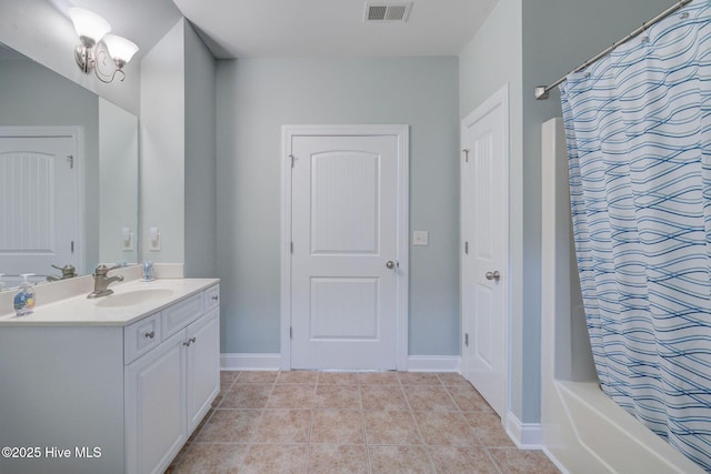 full bathroom with vanity, tile patterned flooring, visible vents, and a shower with curtain