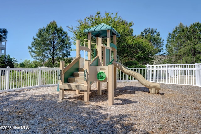 community jungle gym featuring fence