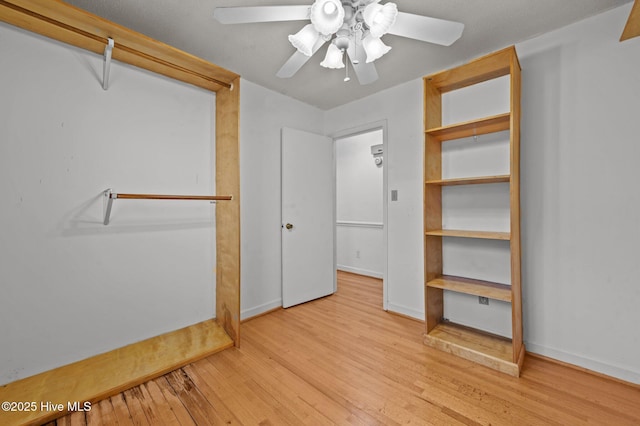 bedroom featuring ceiling fan and light hardwood / wood-style floors