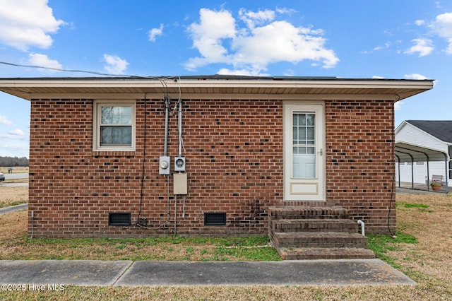 view of front facade with a carport