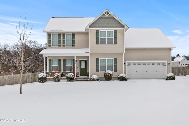 view of front of home featuring a garage and covered porch