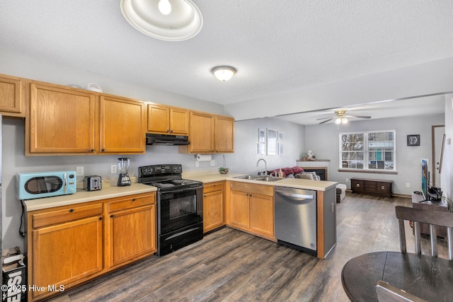 kitchen featuring sink, dark hardwood / wood-style flooring, dishwasher, black range with electric cooktop, and kitchen peninsula