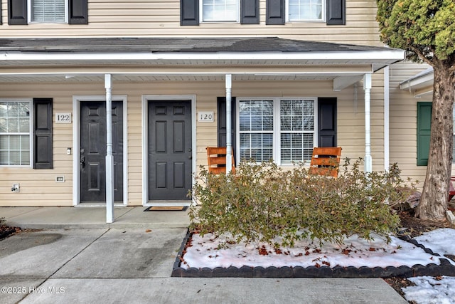 entrance to property with a porch