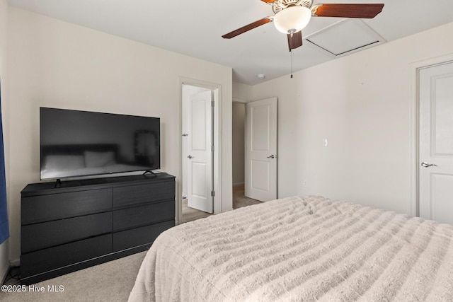 carpeted bedroom with ceiling fan