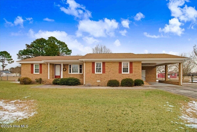 single story home with a front lawn and a carport