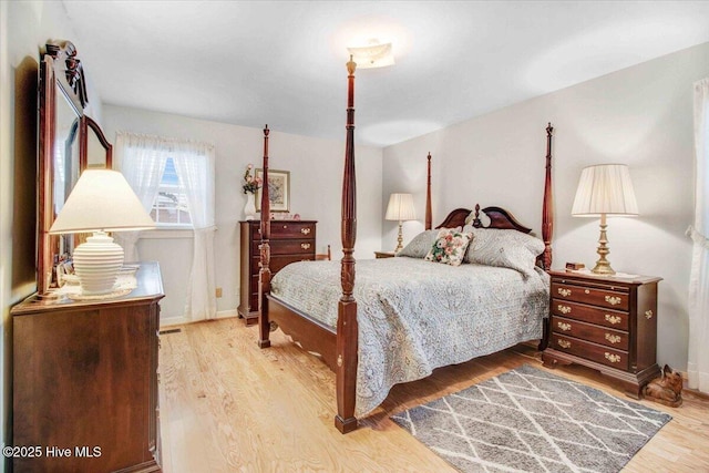 bedroom with light hardwood / wood-style floors