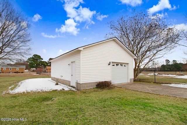 garage featuring a yard