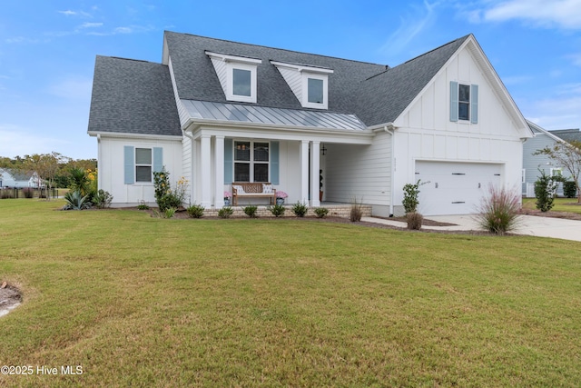 modern farmhouse style home with metal roof, a porch, a shingled roof, board and batten siding, and a front yard