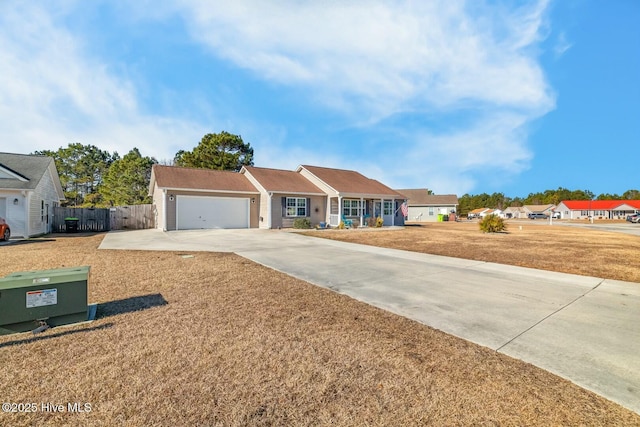 single story home featuring a garage and a front yard