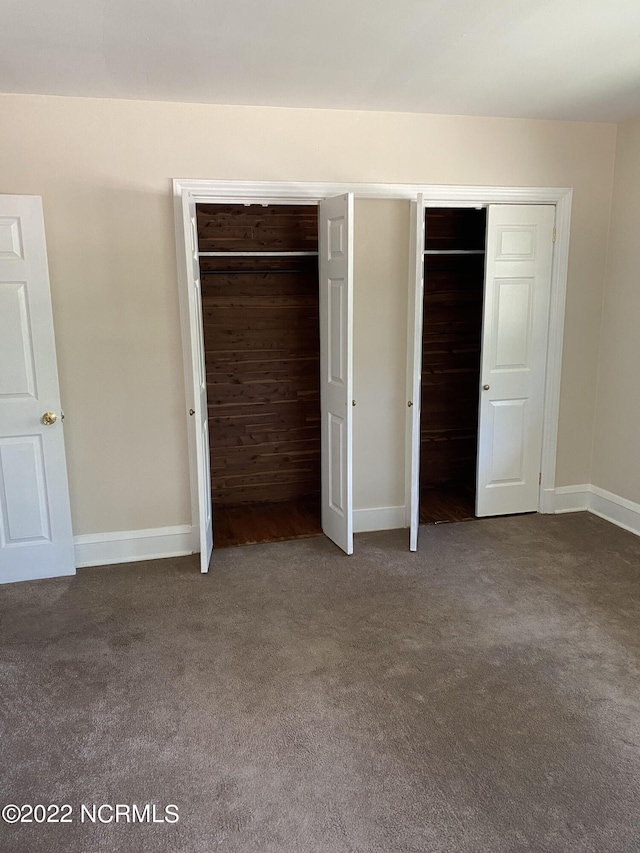 unfurnished bedroom with carpet flooring