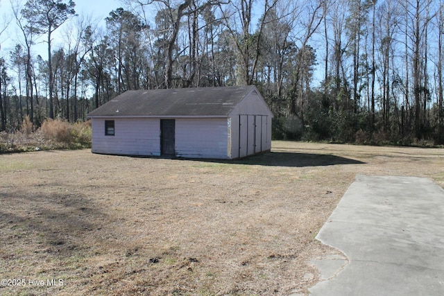 garage featuring a yard