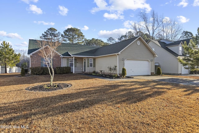 ranch-style home featuring a garage