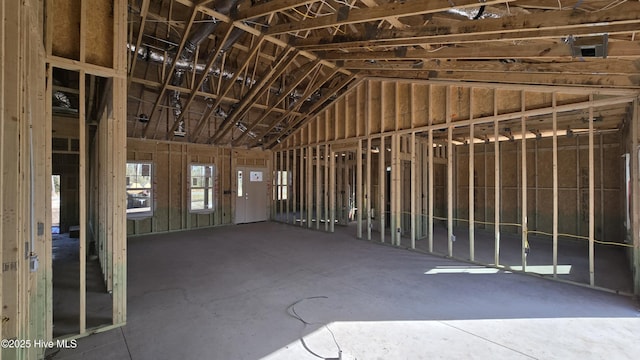 miscellaneous room featuring lofted ceiling