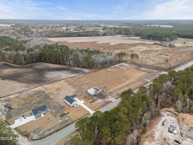 birds eye view of property featuring a rural view