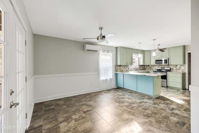 110 NE 29th St, Oak Island, NC 28465 - kitchen featuring appliances with stainless steel finishes, an AC wall unit, a ceiling fan, and green cabinets