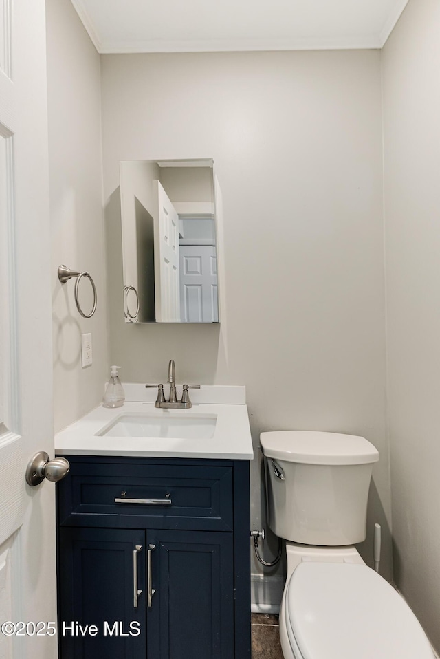 110 NE 29th St, Oak Island, NC 28465 - half bathroom with vanity and crown molding