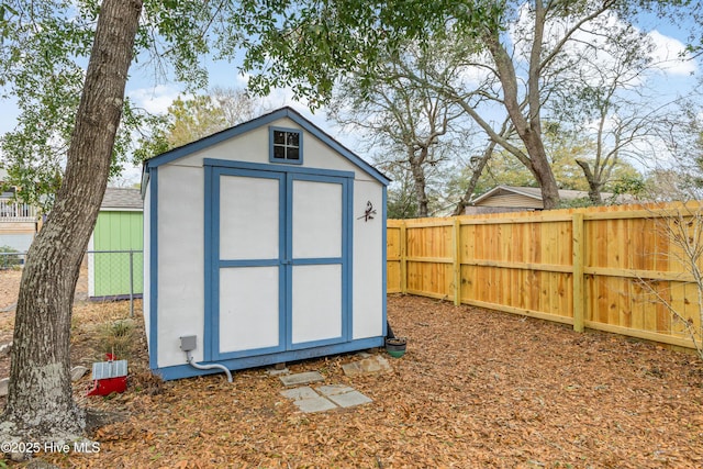 110 NE 29th St, Oak Island, NC 28465 - view of shed featuring a fenced backyard