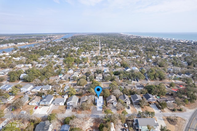 bird's eye view featuring a residential view and a water view