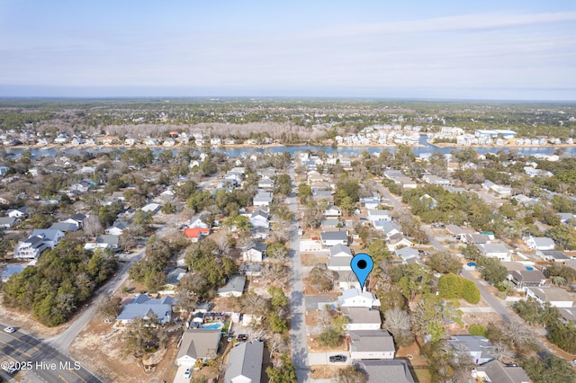 aerial view with a residential view and a water view