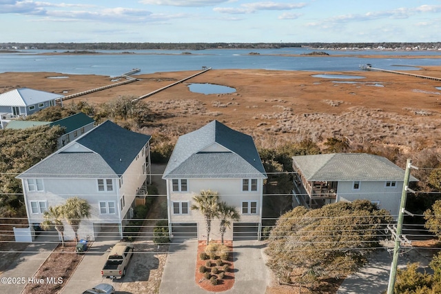 drone / aerial view featuring a water view