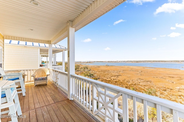 deck featuring a water view