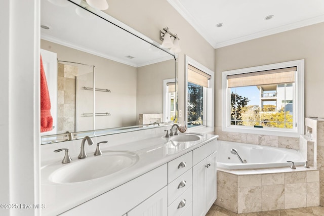 bathroom with crown molding, a relaxing tiled tub, and vanity