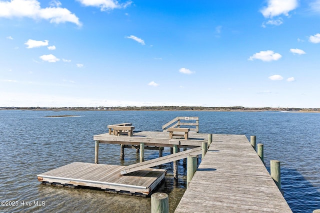 view of dock with a water view